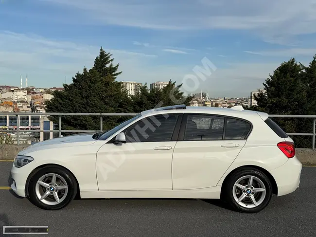 سيارة BMW 1.18 İ JOY PLUS موديل 2016 مع فتحة سقف