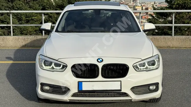 سيارة BMW 1.18 İ JOY PLUS موديل 2016 مع فتحة سقف