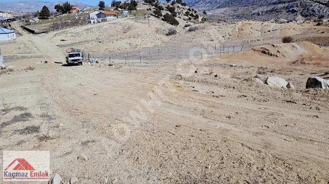 A cheap fenced plot of land in KORKUTELİ from Çağrı Koç