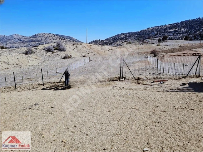 A cheap fenced plot of land in KORKUTELİ from Çağrı Koç