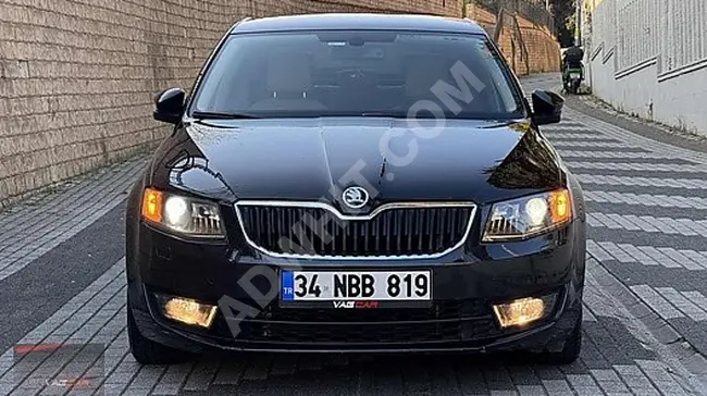 سيارة SKODA OCTAVİA-1.6 TDI DSG موديل 2015 - صيانة وكيل -بدون تغيير -داخلي أسود بيج