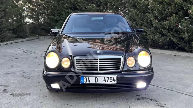 سيارة Mercedes - Benz 98 E 200 - غاز طبيعي E1 باقة