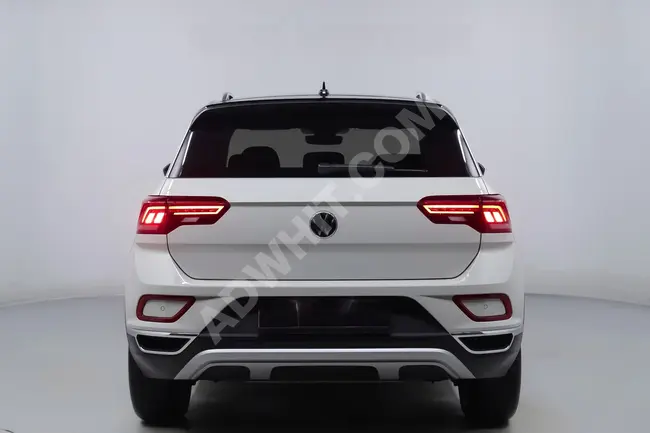 سيارة T-ROC 1.5TSİ DSG STYLE موديل 2024 - LANSMAN لون مزدوج - شاشة - بمسافة 7,000 كم!