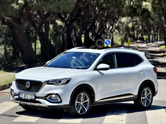 سيارة MG HS 1.5 T-GDI LUXURY موديل 2024 طراز جديد، بمسافة 14 ألف كم، سقف زجاجي بانورامي