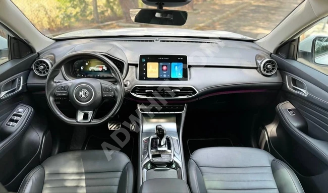سيارة MG HS 1.5 T-GDI LUXURY موديل 2024 طراز جديد، بمسافة 14 ألف كم، سقف زجاجي بانورامي