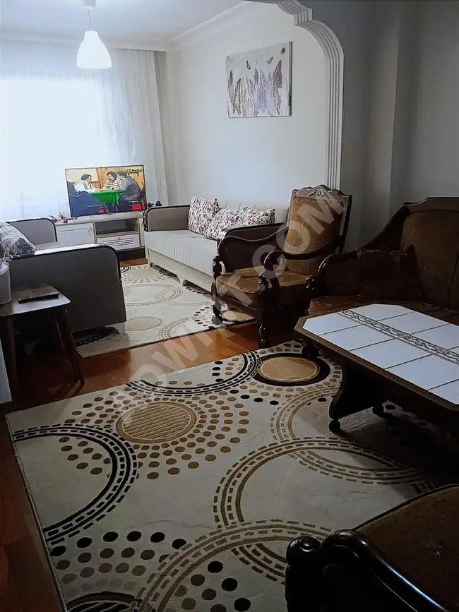 Apartment for sale 2+1 with a 20 square meter share in ESENLER TURGUT REIS