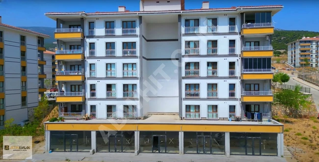 محل تجاري للبيع بمساحة 55 متر مربع + 20 متر مربع في İzmir Kemal paşa Toki