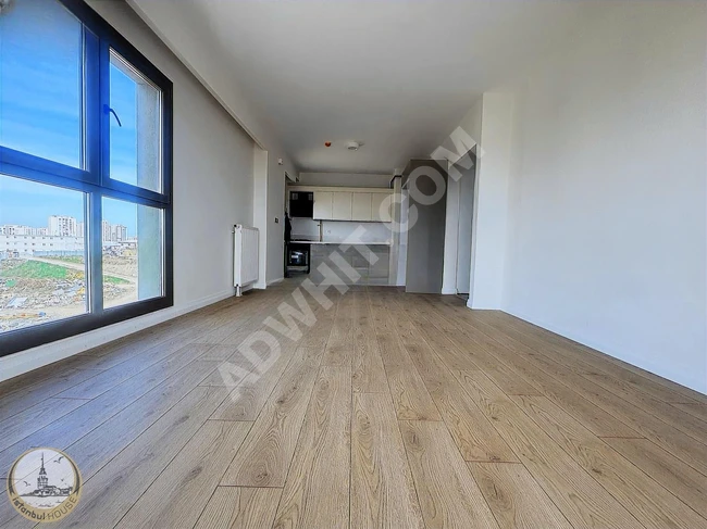 EMLAK KONUT BİZİM MAHALLE 3.KISIMDA SIFIR ARAKAT GENİŞ 1+1 DAİRE