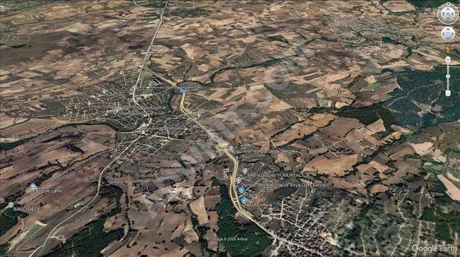 An investment land plot with an area of 1000 square meters facing the road, only 80 meters away from the highway, located right next to the village.