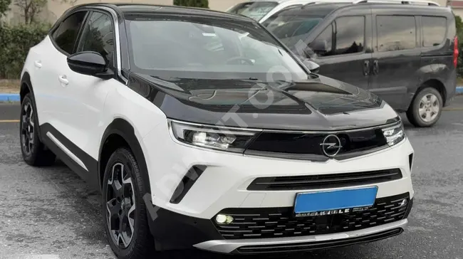 سيارة موديل 2023 MOKKA-E +BOLD بدون خطوط، إمكانية القرض والتبديل بنسبة 1.99.