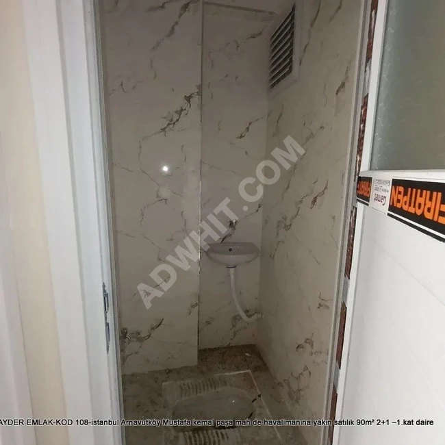 Apartment for sale near the airport with an area of 90 m², 2+1 – first floor in Arnavutköy, Mustafa Kemal Paşa district.
