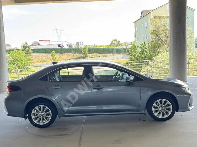 2021.MODEL.62.BİN.KM.DE COROLLA.1.8.HYBRİD.DREAM.PAKET.
