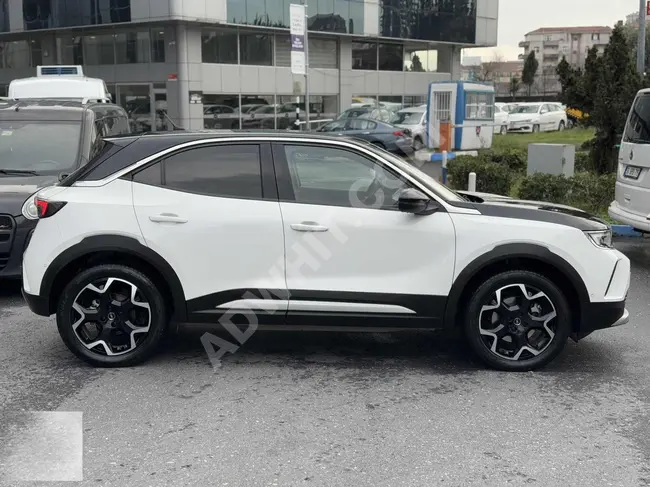 سيارة موديل 2023 MOKKA-E +BOLD بدون خطوط، إمكانية القرض والتبديل بنسبة 1.99.