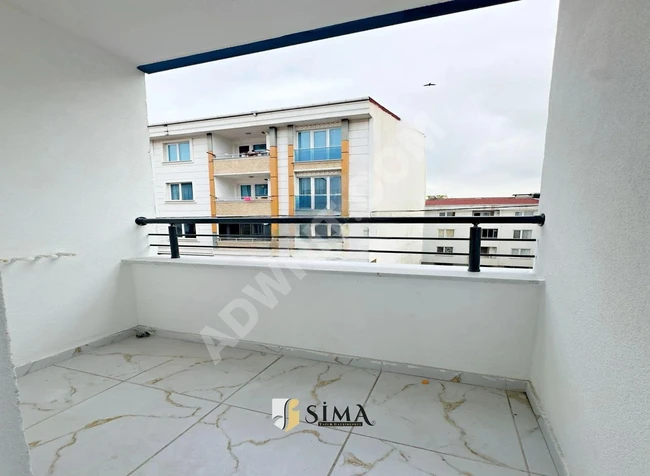 A central 2+1 apartment with a balcony for sale in a new building, with the possibility of an 80% loan.