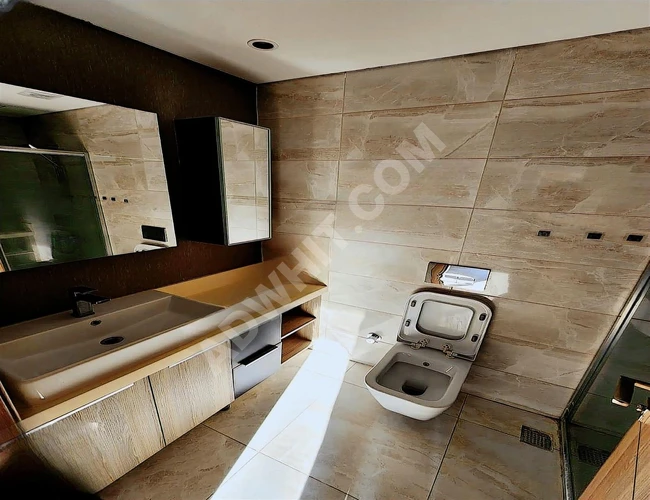 2+1 apartment in the EVİM YÜKSEKDAĞ complex with a balcony overlooking the pool.