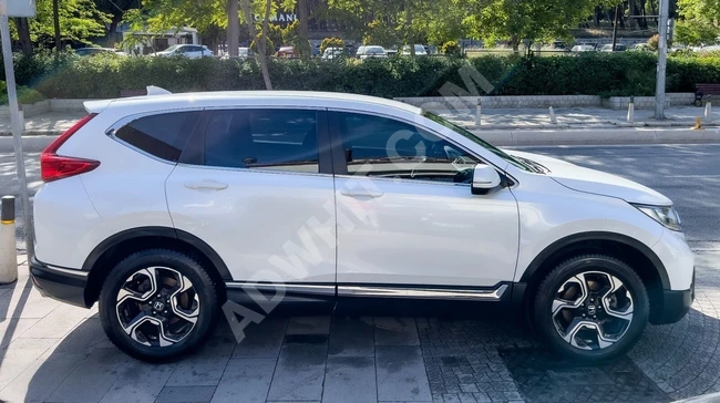 سيارة CR-V 1.5 VTEC 4X4 ELEGANCE موديل 2018 - صيانات منتظمة في الوكالة