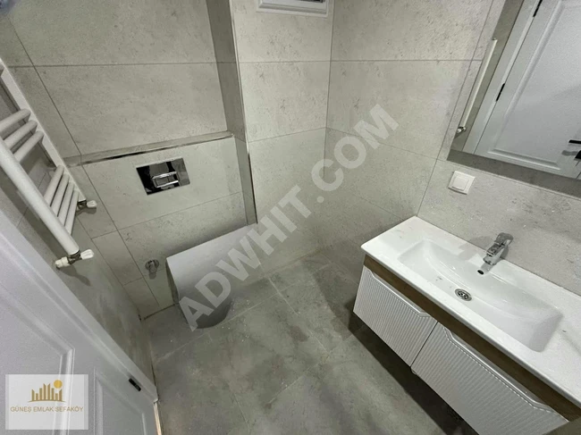 SEFAKÖY MERKEZE YAKIN OTOPARKLI SIFIR 2+1 85m KREDİLİ 2.KAT
