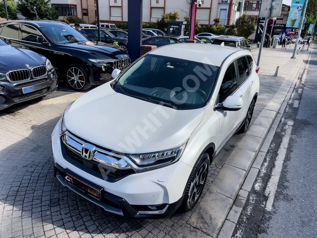 سيارة CR-V 1.5 VTEC 4X4 ELEGANCE موديل 2018 - صيانات منتظمة في الوكالة