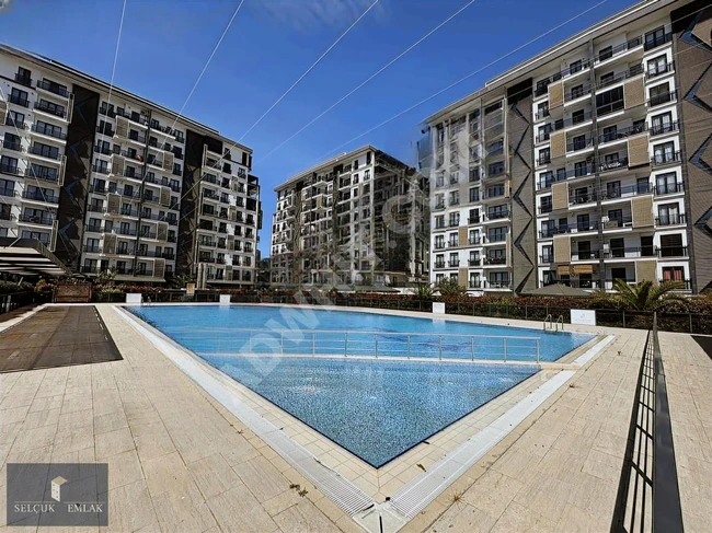 SELÇUK EMLAKTAN LÜKS SİTE İÇERSİNDE ARA KATTA 3+1 SATILIK DAİRE