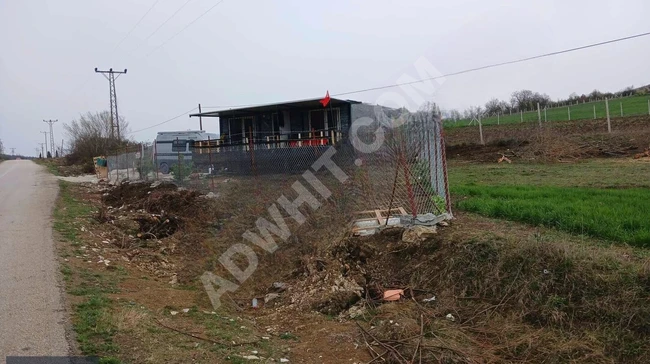 Equipped agricultural land next to the asphalt road for sale with an area of 227 m2
