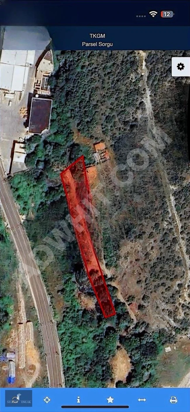 Level land for sale in BİLECİK MERKEZ with a river running next to it.