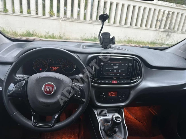 ميني فان doblo بمسافة 49 ألف كم