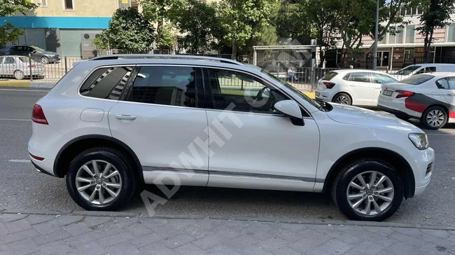 سيارة VW TOUAREG 3.0 TDI BMT V6 موديل 2013 - بدون تغيير