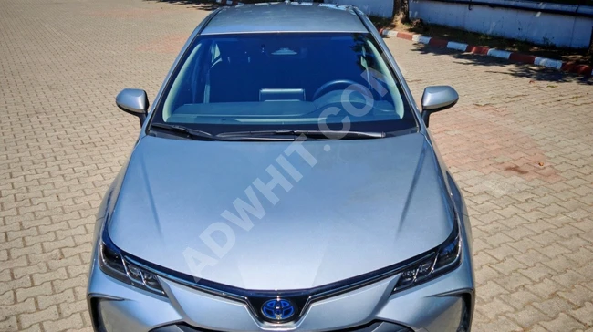 سيارة Corolla 1.8 Hybrid Dream موديل 2023 ، بقوة 140 حصان - بمسافة 42,000 كم