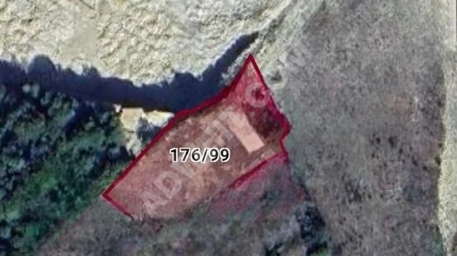 A plot of land with an area of 2 dunams, with road access, in the village of KANDIRA AKINCILAR.