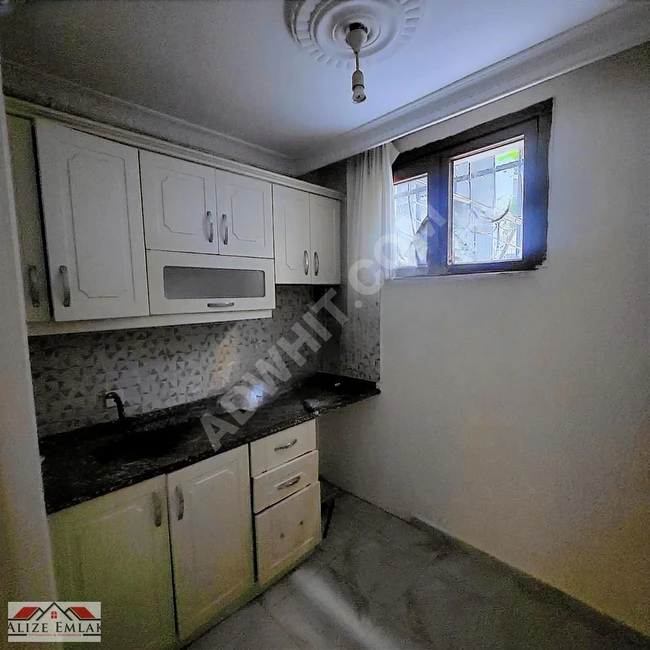 Apartment for rent, garden floor, bright, in a new building at Halkali Square.