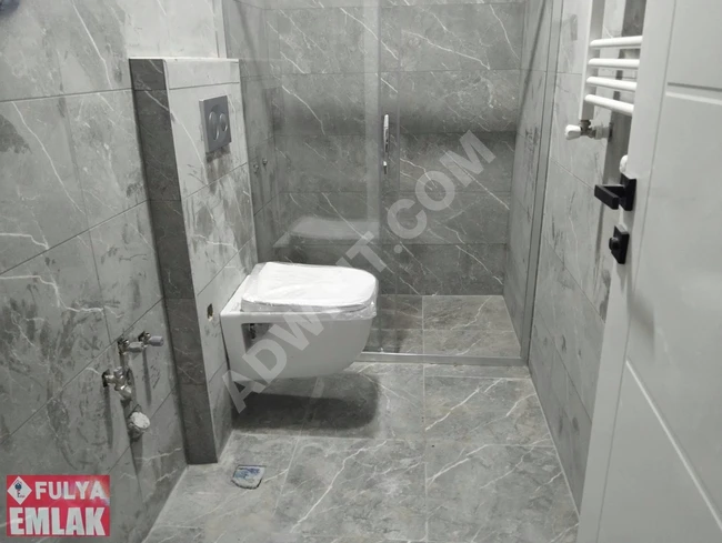 شقة جديدة 1+1 تبعد 8-10 دقائق عن المترو والمتروباص