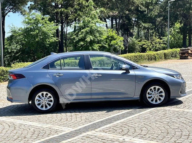 ORJİNAL_2021_MODEL_TOYOTA_COROLLA_HYBRİD_1.8_DREAM_97_BİNDEEE