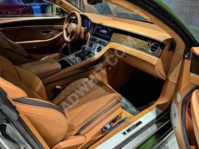 سيارة موديل GT SPEED W12 SPECIAL EDITION 2023 إصدار خاص باللون الأخضر البريطاني للسباقات