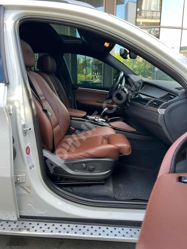 BMW X6 35D XDRIVE model 2010 - No defects and no paint, with 270,000 km mileage.