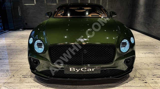 سيارة موديل GT SPEED W12 SPECIAL EDITION 2023 إصدار خاص باللون الأخضر البريطاني للسباقات