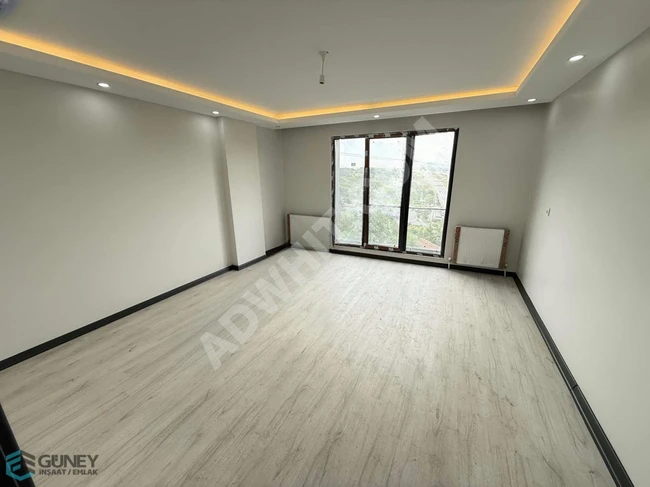 New 2+1 apartment with an area of 90 square meters, with a balcony and elevator, for sale by GÜNEY Real Estate.