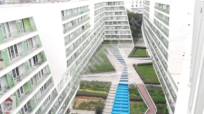 PENDIK LENS YANI DUMANKAYA FLEX SITESI 1+0 BALKONLU CADDE CEPHE