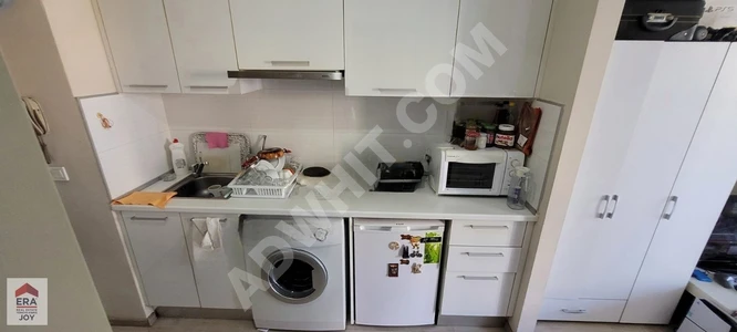 PENDIK LENS YANI DUMANKAYA FLEX SITESI 1+0 BALKONLU CADDE CEPHE