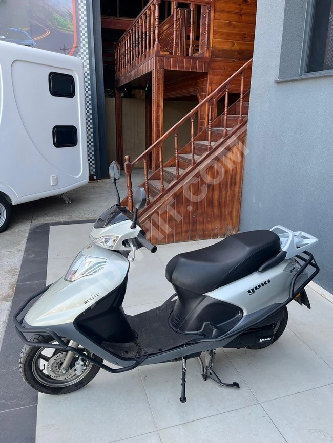 MERT MOTO DAN YUKİ ACTİVE 125 TEMİZ AZ KULLANILMIŞ