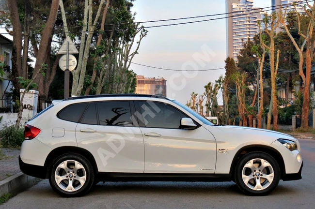 سيارة BMW X1 2.0 DİZEL X DRİVE بفتحة سقف بانورامية