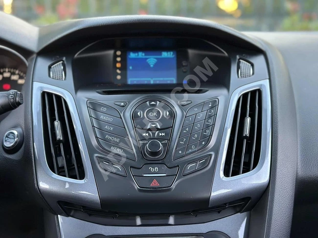سيارة FOCUS TITANIUM-SUNROOF-1.6 TDCI موديل 2013 بقوة 115 حصان- بدون حوادث