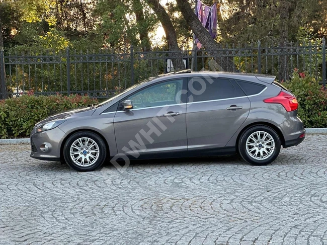 سيارة FOCUS TITANIUM-SUNROOF-1.6 TDCI موديل 2013 بقوة 115 حصان- بدون حوادث