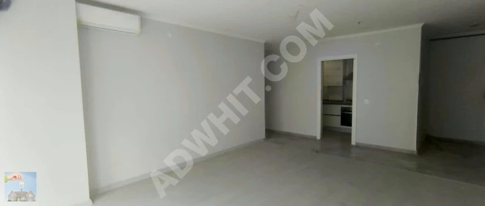 2+1 apartment in a new building with a parking space, second floor on BEŞİKTAŞ NÜZHETİYE street.