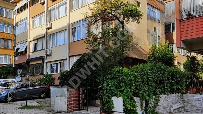 Apartment in a low-rise building, second floor, front facade.