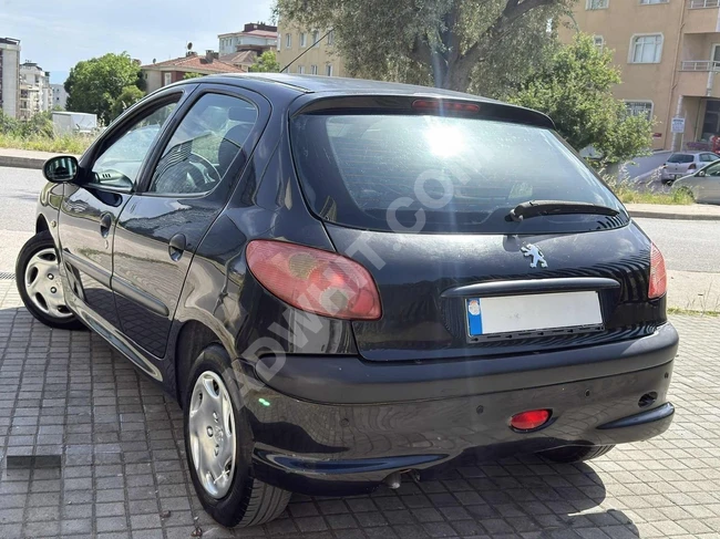 TİTAN MOTORS 112 BİN KM PEUGEOT 206 1.4 BENZİN TAM OTOMATİK 2006