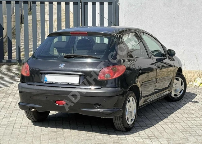 TİTAN MOTORS 112 BİN KM PEUGEOT 206 1.4 BENZİN TAM OTOMATİK 2006