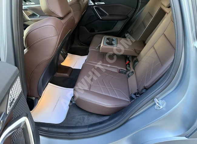 سيارة BMWX1 M SPORT موديل 2024 ، شاشة عرض رأسية - 360 درجة - نقطة عمياء - متابعة المسار.