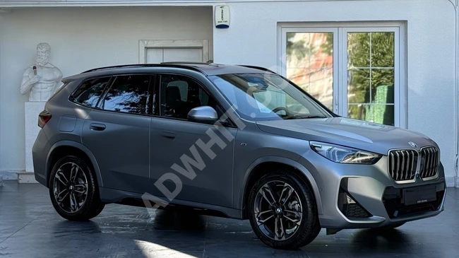 سيارة BMWX1 M SPORT موديل 2024 ، شاشة عرض رأسية - 360 درجة - نقطة عمياء - متابعة المسار.