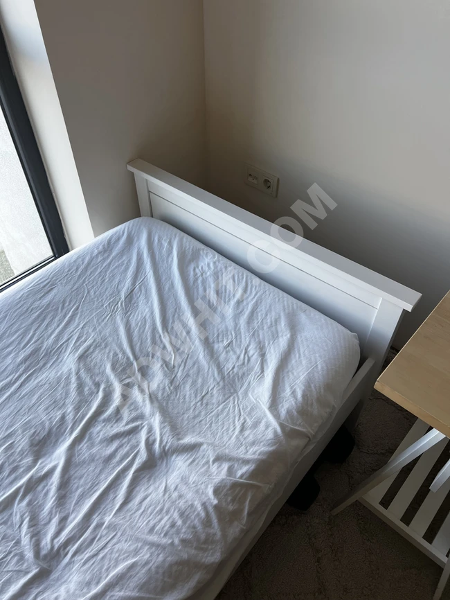 Tek kişilik yatak takımı, yatak örtüsü ve yastık, IKEA'dan.