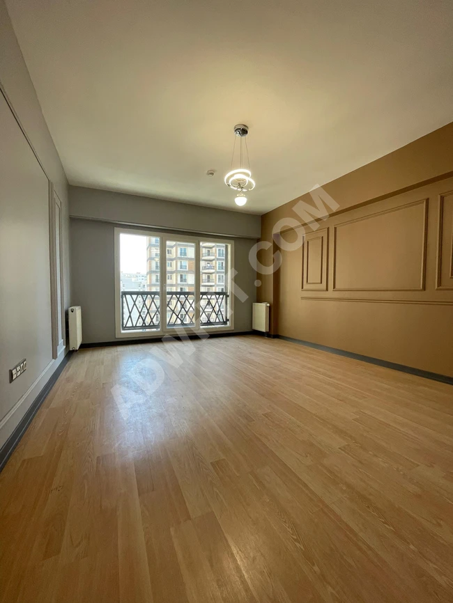 An apartment with a garden view in a complex near the metro for urgent sale in Istanbul.